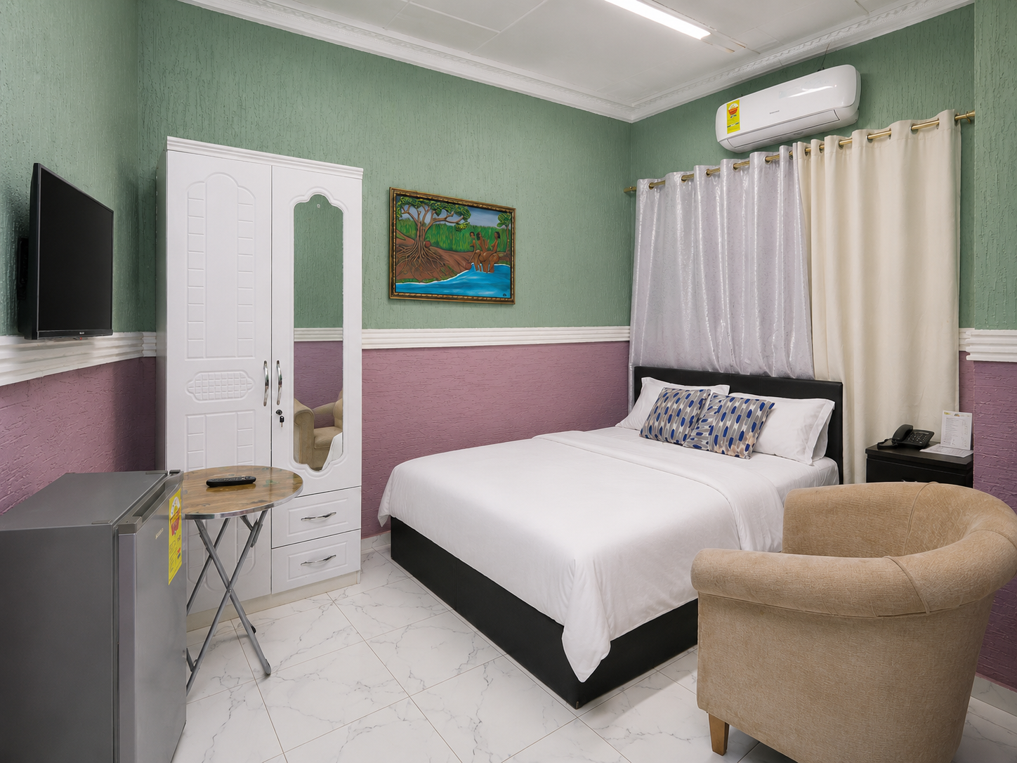 Twin room with two neatly prepared beds
